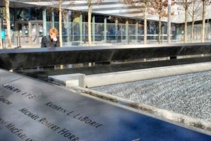 Somberly Photographing the 9/11 Memorial in New York City