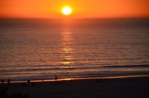 Sunset silhouettes on the beach at Coronado Island, San Diego
