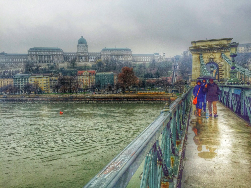 Afternoon walk in the rain on the famous Chain Bridge in Budapest, Hungary