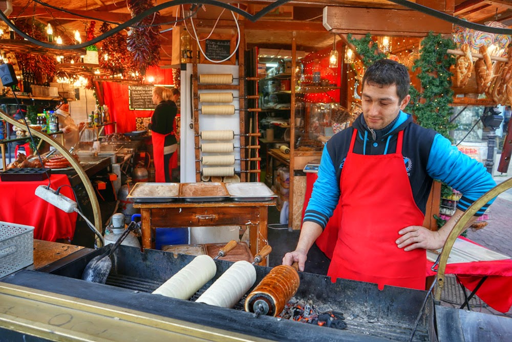 Vender makes Chimney Cakes in the Budapest Christmas Market