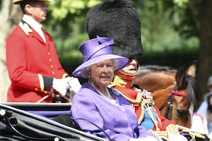London, UK - June 17, 2006: Queen Elizabeth II and Prince Philip seating on the Royal Coach at Trooping the colour ceremony, also known as the Queen's Birthday Parade