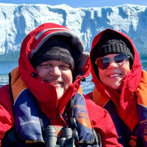 David and Carol Porter exploring iceberg in Canadian Arctic