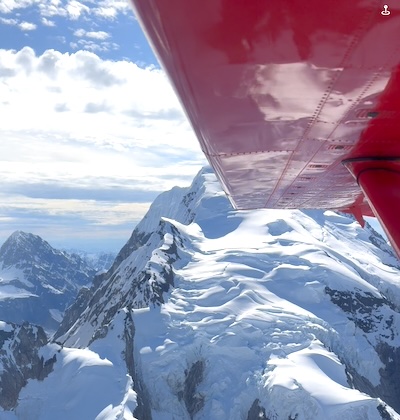 Aerial view of snow-covered peaks near Denali during our Tauck Bridges Call of the Wild flightseeing adventure in Alaska.