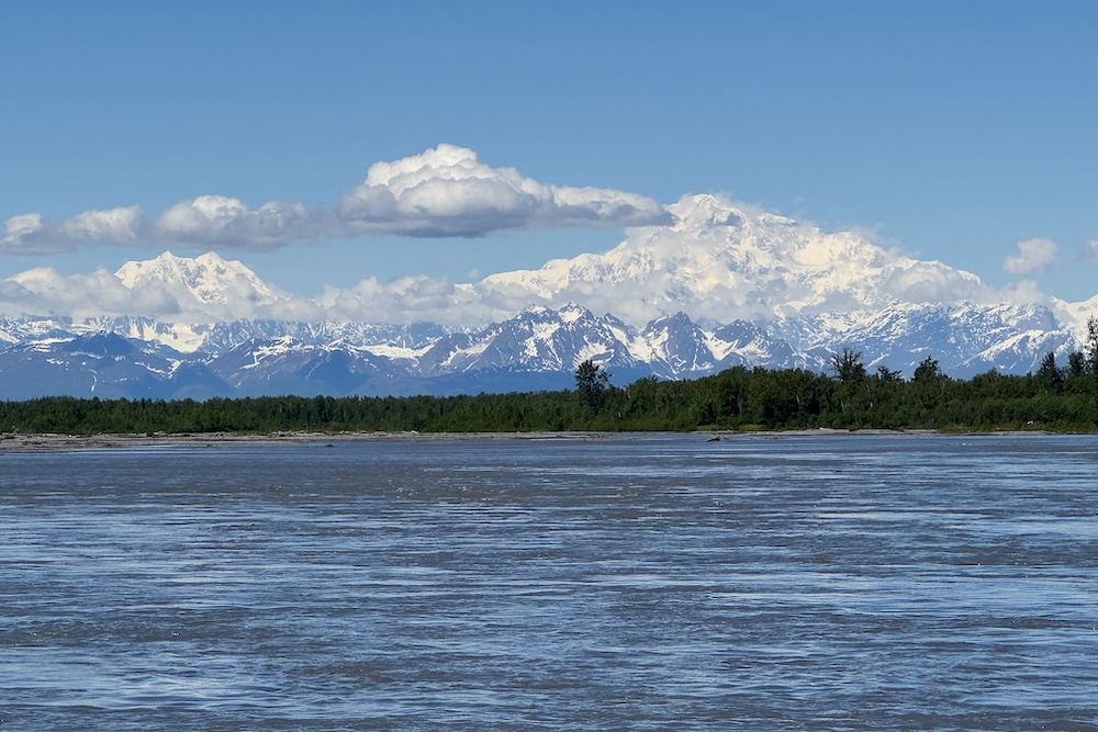 Spectacular view of Denali rising above the Alaska Range during our Tauck Bridges jet boat adventure on the Susitna River in Alaska.